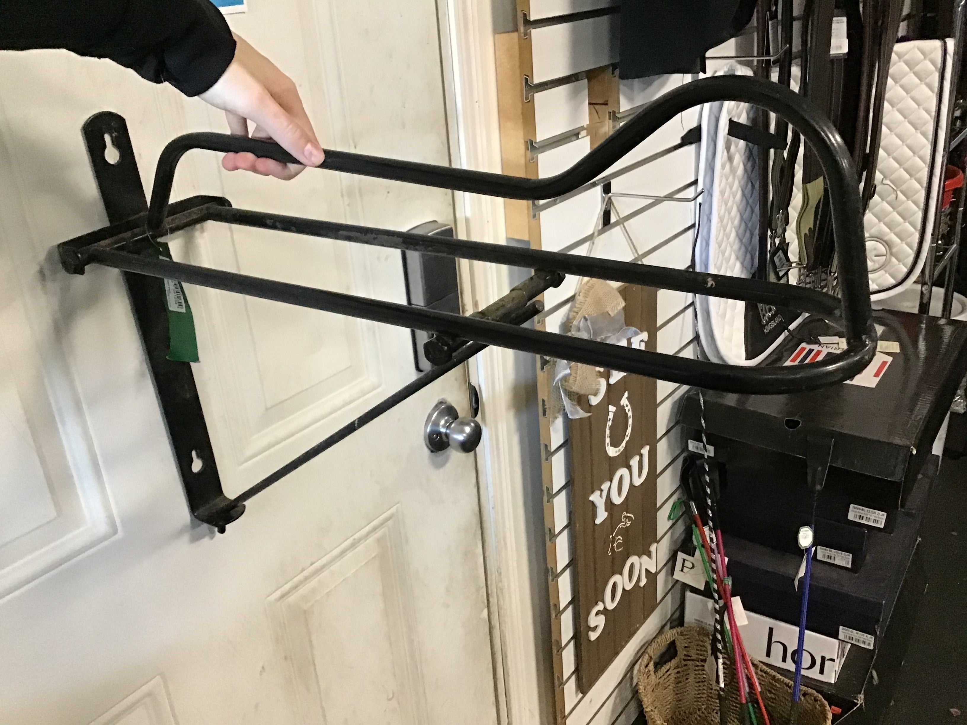 Wall mounted saddle rack