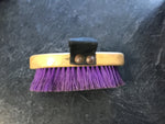Small wooden purple brush