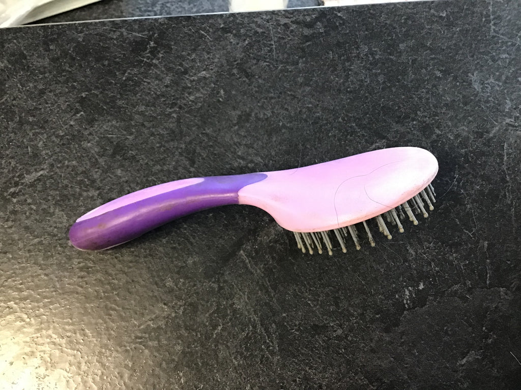 Purple mane brush