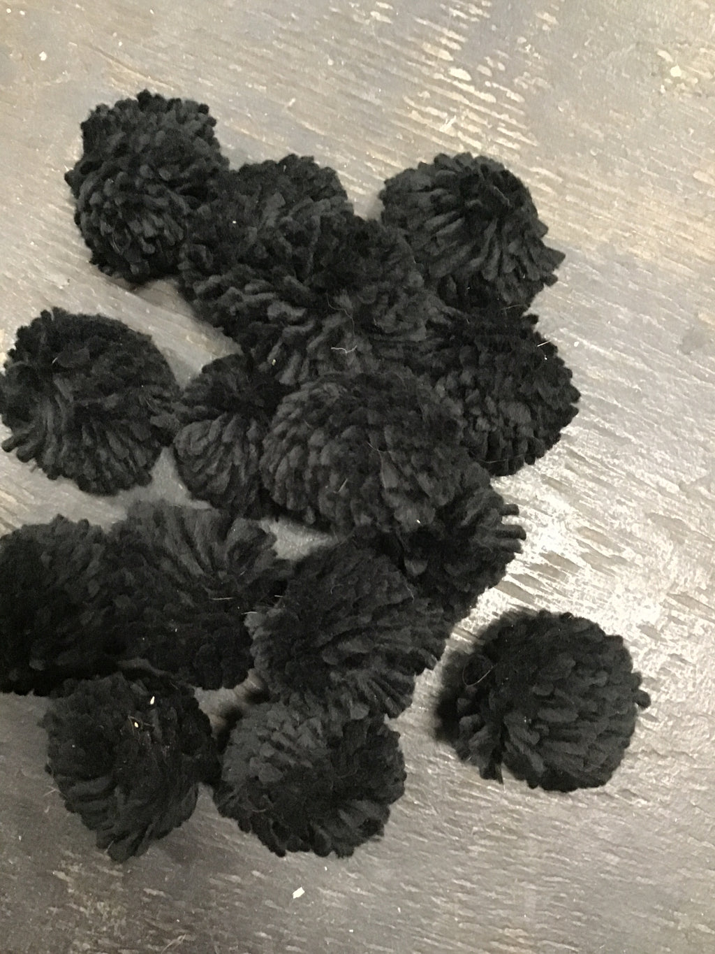 15 pack black ear poms