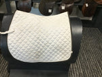 White saddle pad w brown edge and white piping