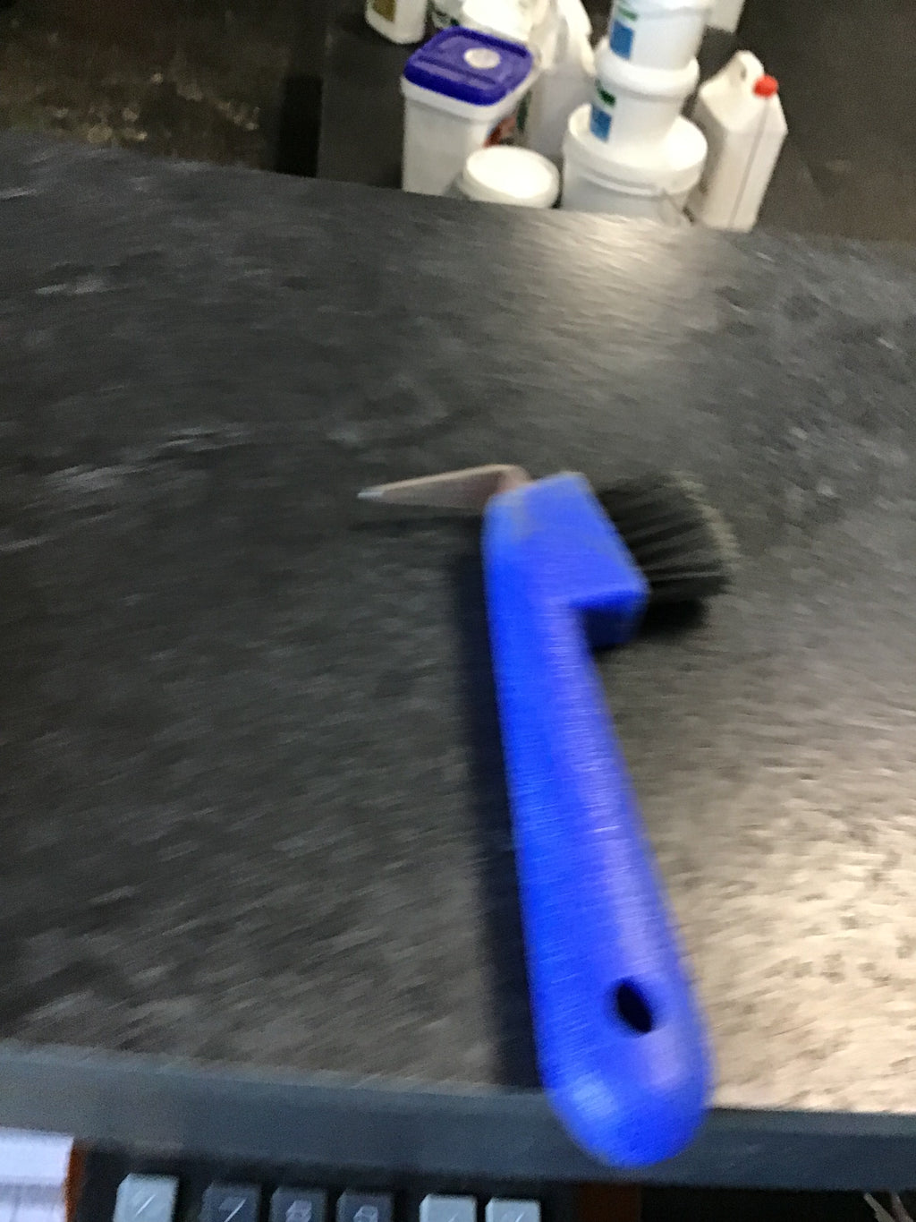 Blue hoof pick