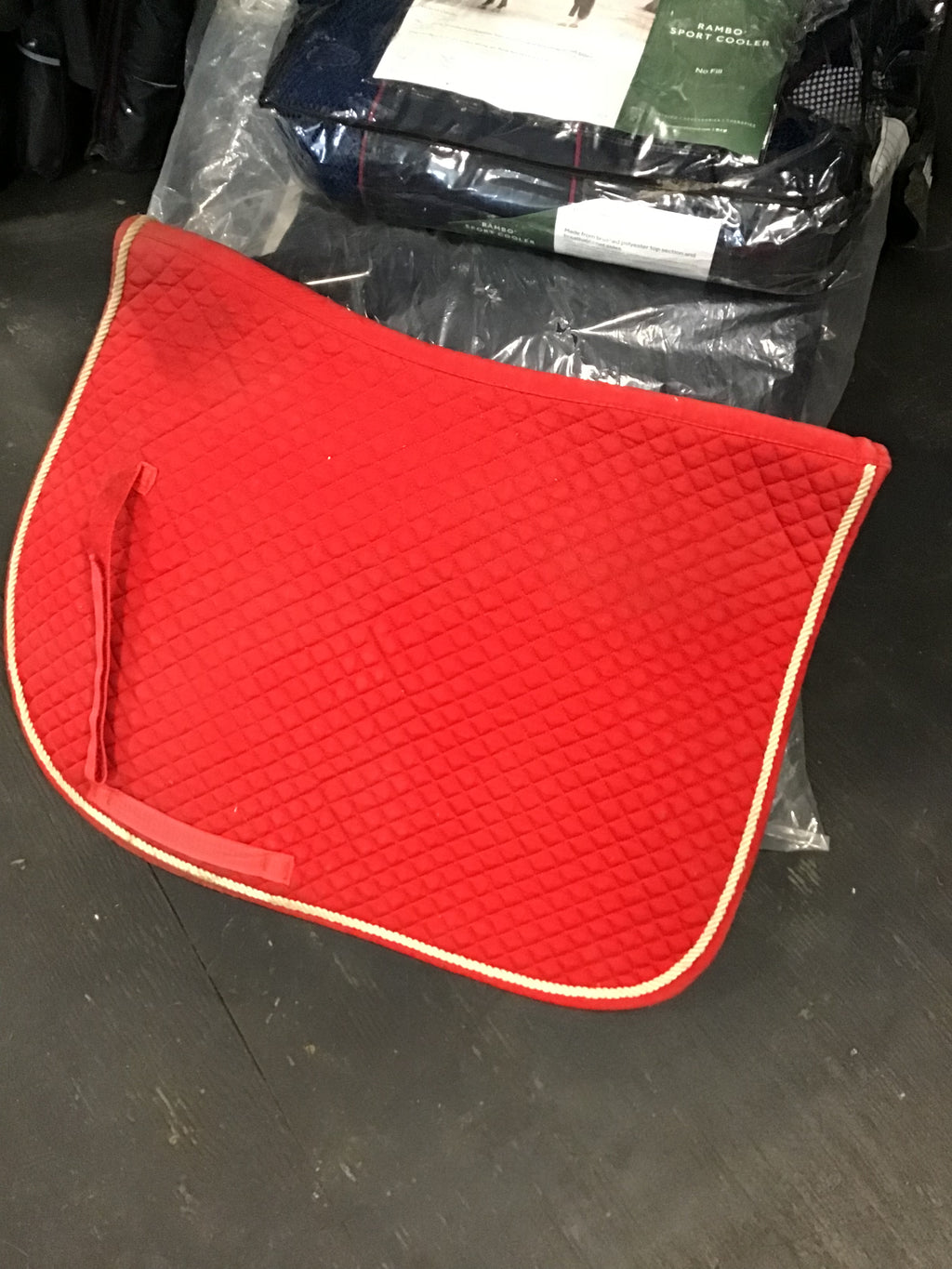 Red saddle pad w gold piping