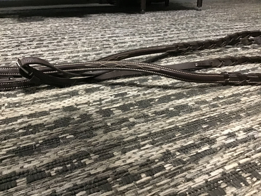 Braided stitched leather reins