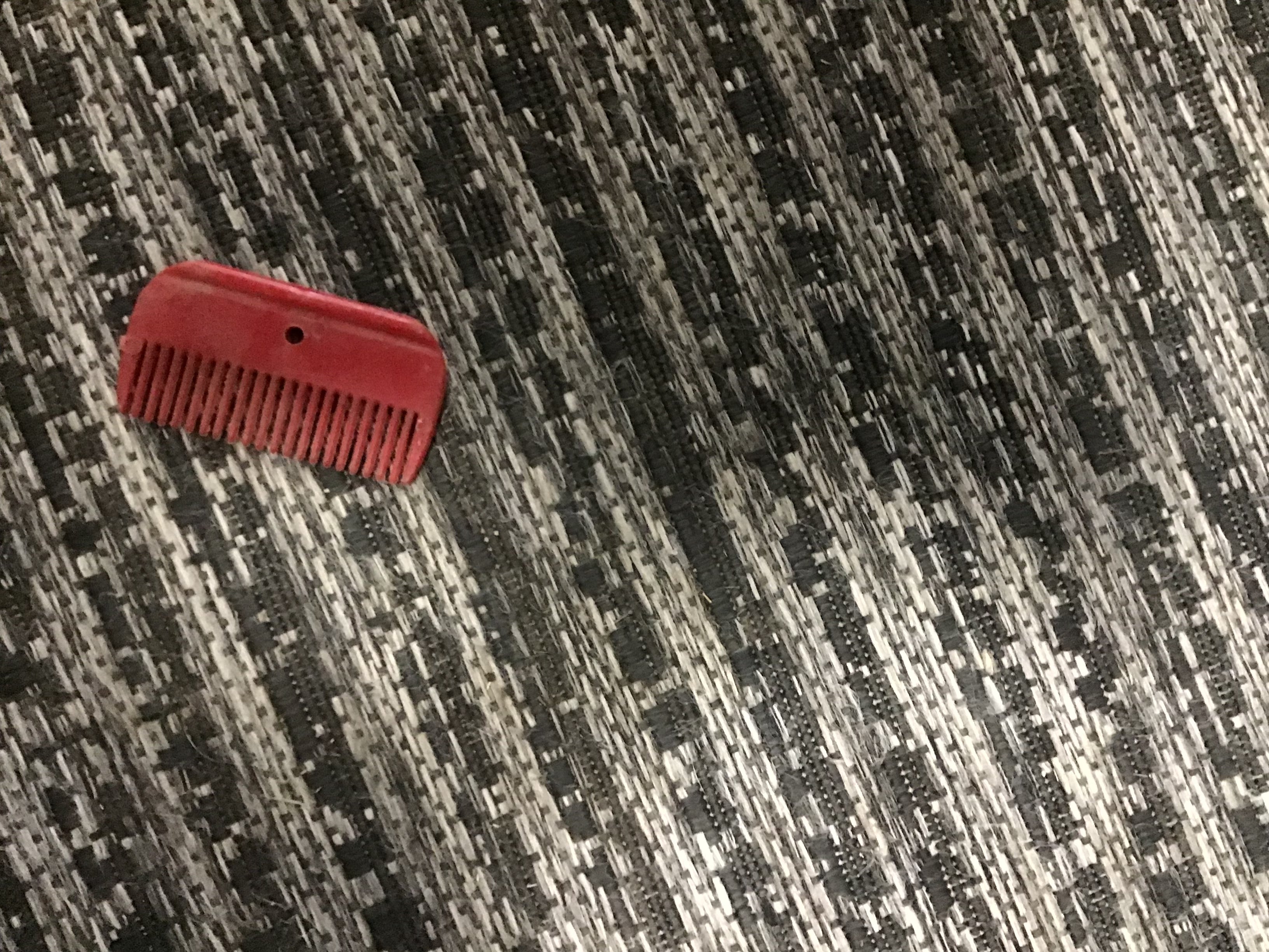 Red plastic comb