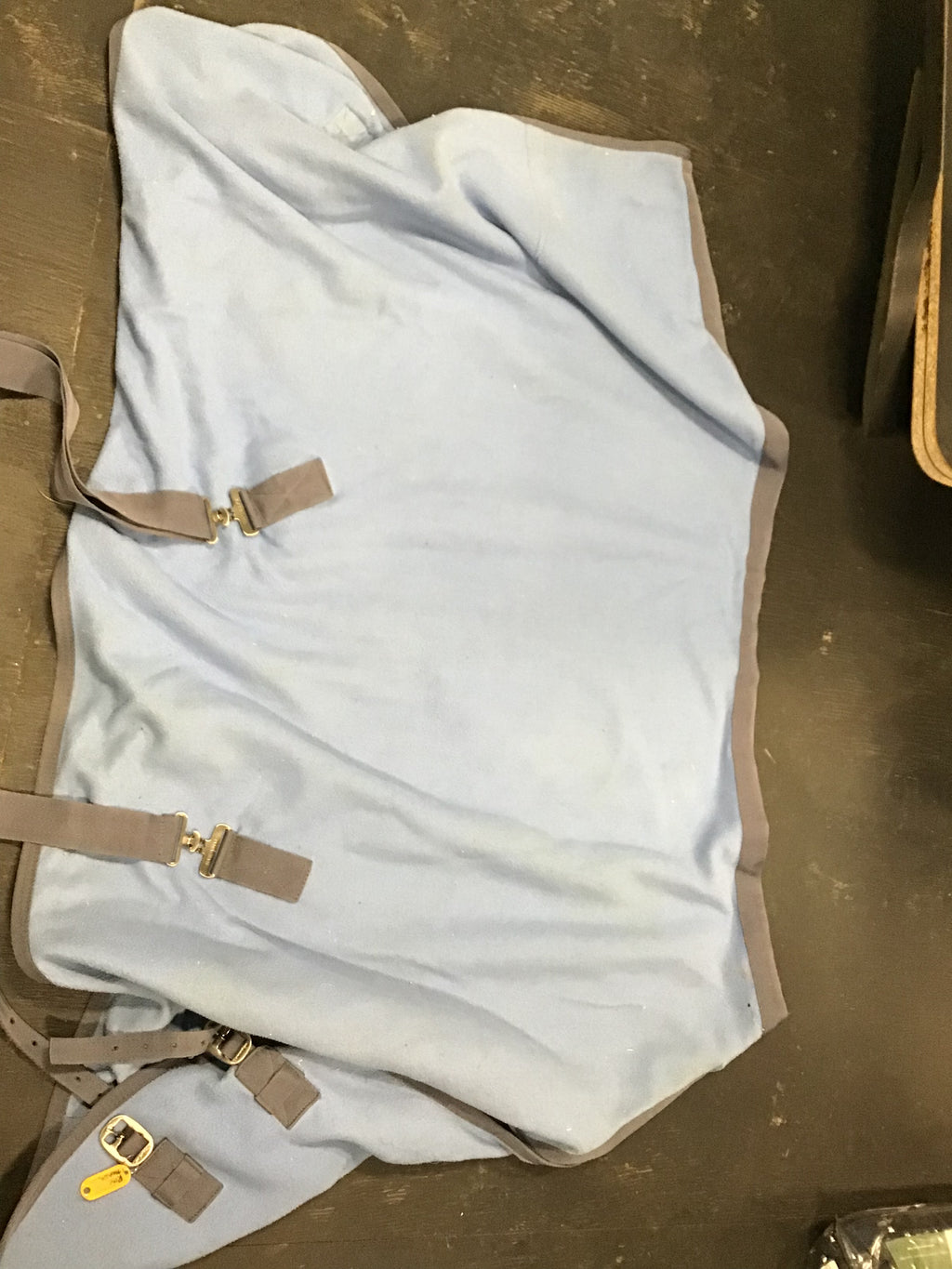 Light blue cooler w grey straps 78”