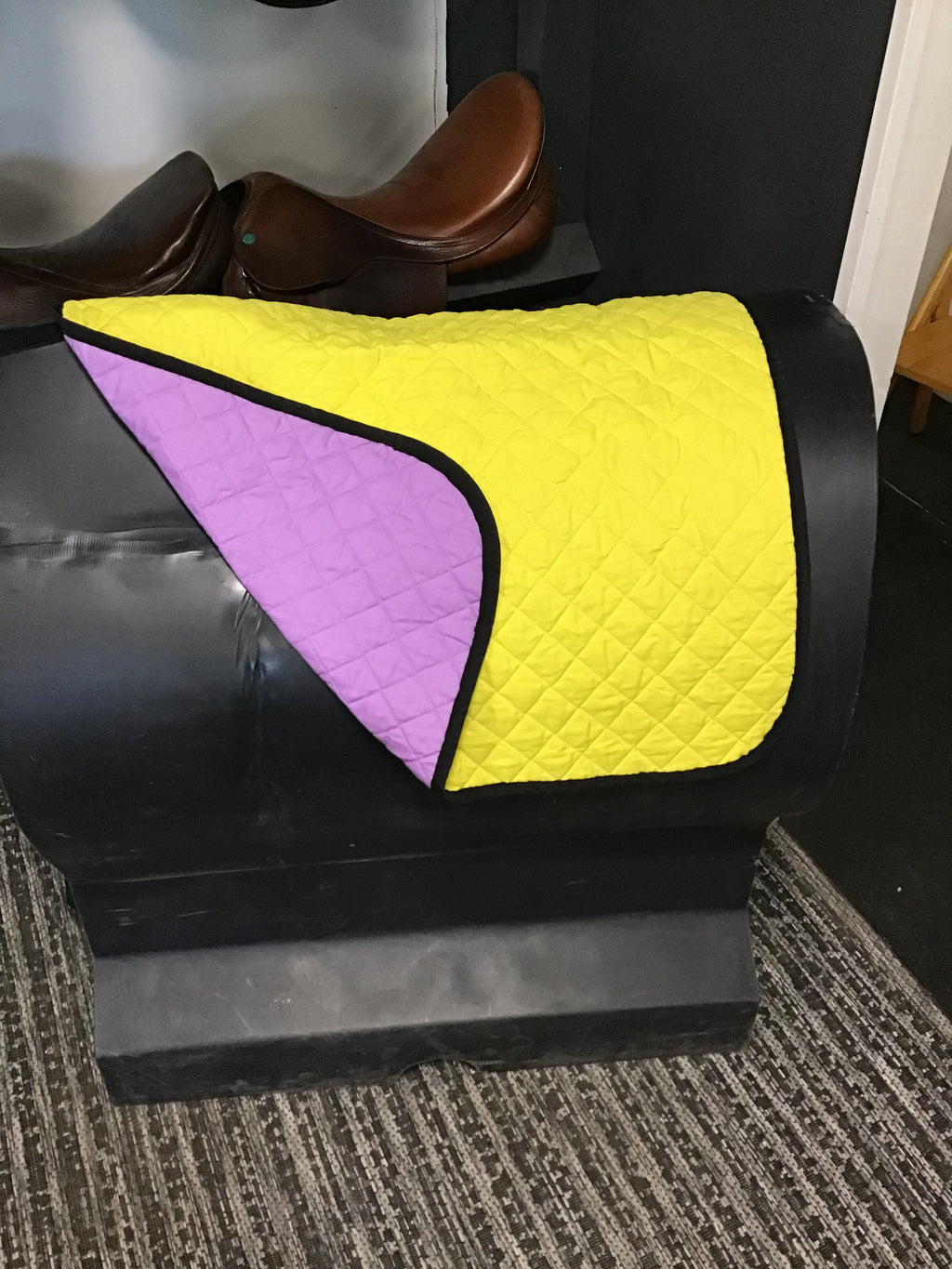 Yellow and purple reversible baby pad