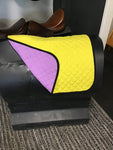 Yellow and purple reversible baby pad