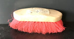 Red dandy brush
